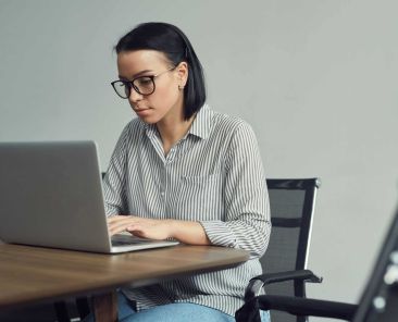 businesswoman-typing-on-laptop-2023-11-27-04-51-13-utc (1)