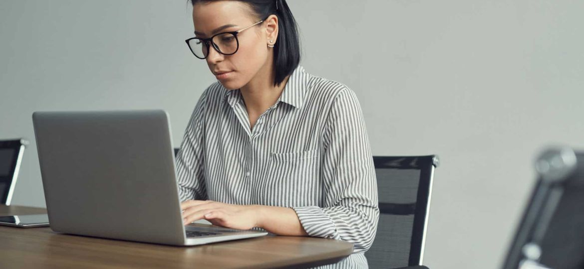 businesswoman-typing-on-laptop-2023-11-27-04-51-13-utc (1)